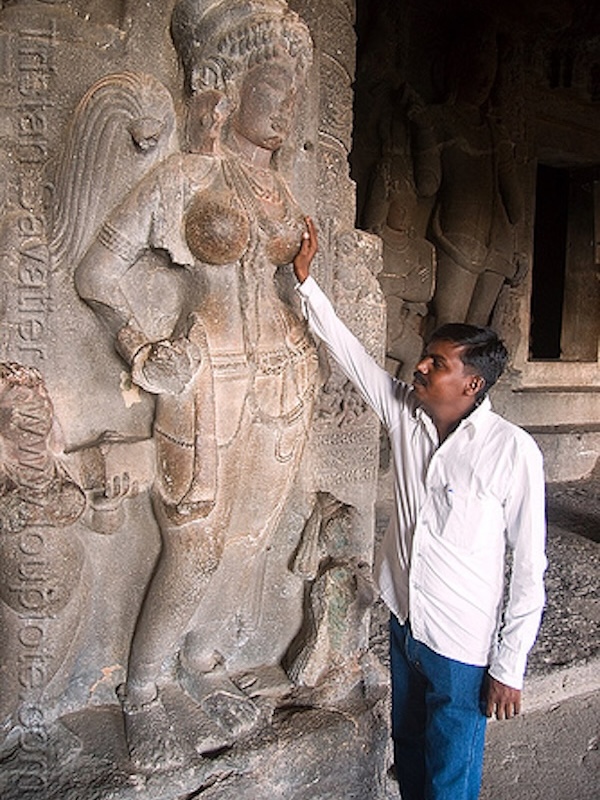 Asian deity with rubbed breasts